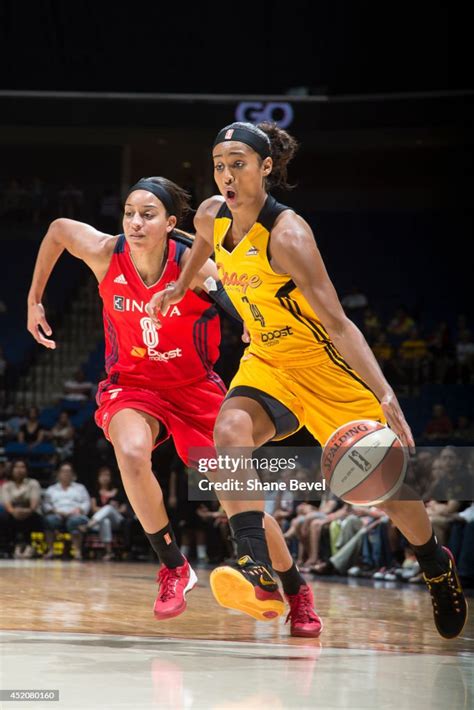 Skylar Diggins Of The Tulsa Shock Drives Against Bria Hartley Of The