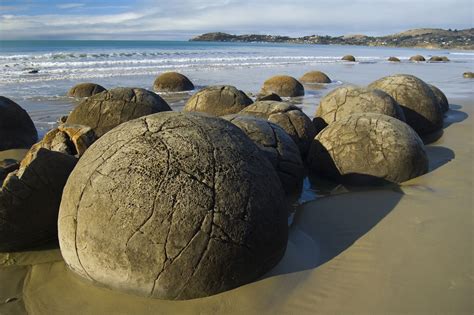 Moeraki Boulders Unusually Large And Spherical Boulders Lying Along A