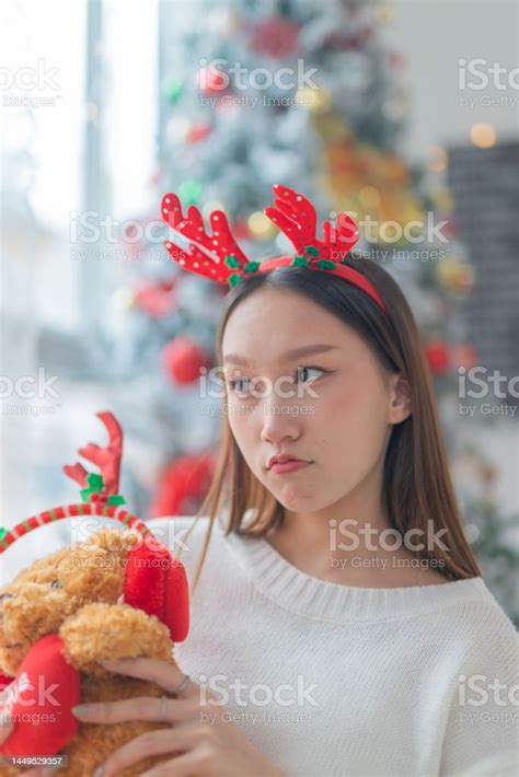 Portrait Photo Of A Young Beautiful Friendly Asian Female Lady With