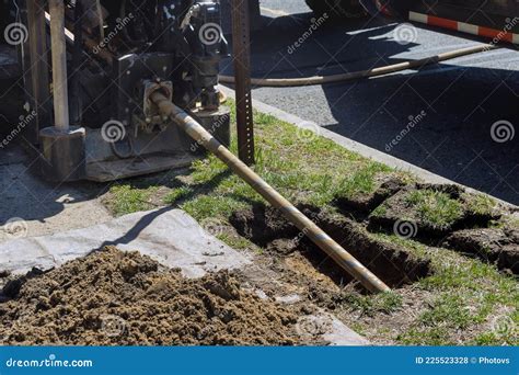 Low Angle View Of Trenchless Laying Of Communications Pipes And Water