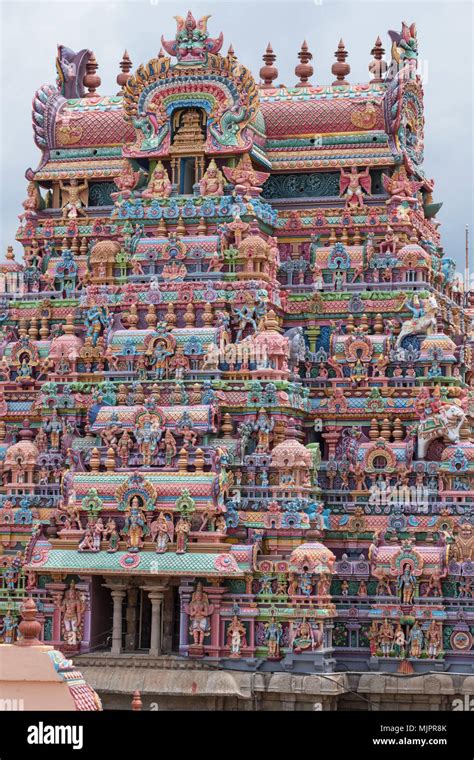 One of the intricately carved and painted entrance gateways, or Gopuram, at the Ranganathaswamy ...