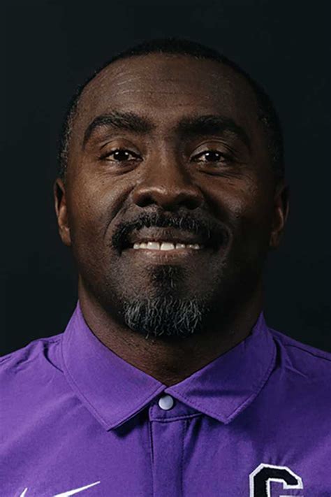 2023 Coaches0001s0001aaron Smith Purple Hoops