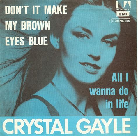 Crystal Gayle, Brown eyes.