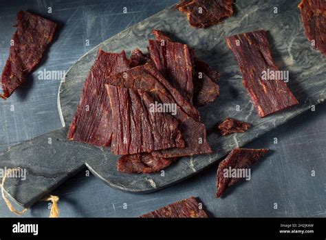 Homemade Healthy Beef Jerky With Salt And Pepper Stock Photo Alamy