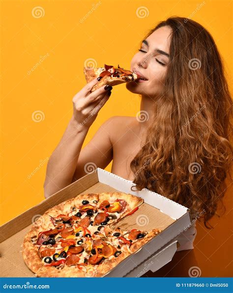 Young Beautiful Woman Eat Pepperoni Pizza Slice And Hold Whole Pizza In