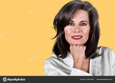 Portrait Beautiful Mature Woman Posing Her Hand Her Chin Wearing Stock