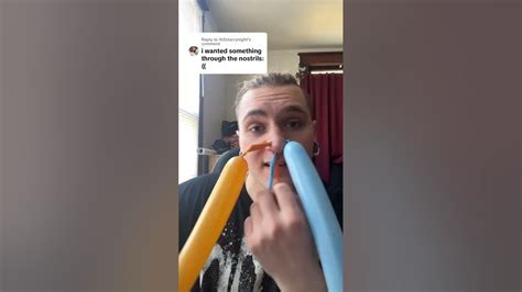 Guy Puts Balloons Through His Stretched Piercings And Ties Them Behind His Head Youtube