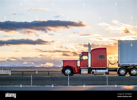 Industrial Long Hauler Big Rig Red Semi Truck Tractor With Chrome Parts