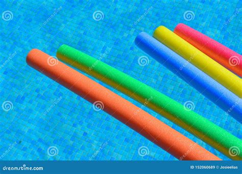 Five Vibrant, Brightly Coloured Pool Noodles in a Swimming Pool, No People Stock Image - Image ...