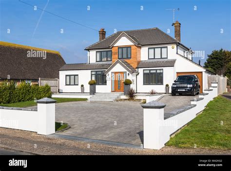 Large modern new detached house in a town in West Sussex, England, UK ...