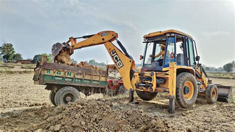 JCB 3dx Loading Mud In TATA 2518 Tipper Mahindra NOVO 605 Stuck In Mud