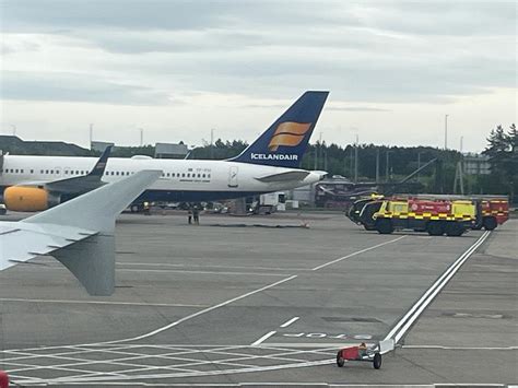 Dramatic Moment Passenger Plane Swarmed By Fire Crews At Glasgow