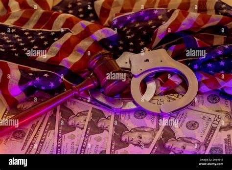 Financial Coruption Legal Justice The Wooden Judgment Gavel Police Handcuffs Of Cash Us Dollars