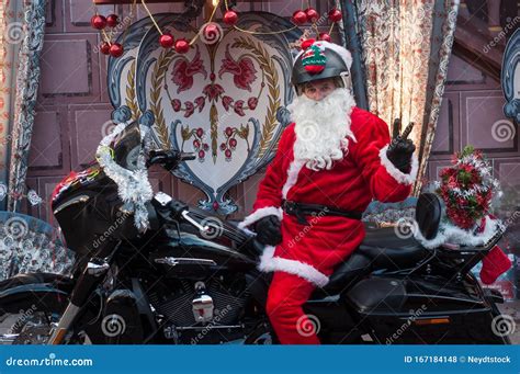 Biker with Santa Claus Costume on Harley Dadidson Motorbike Posing in the Street for Animals ...