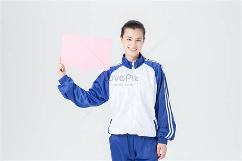 High School Students Wear School Uniforms And Display Handheld D ...