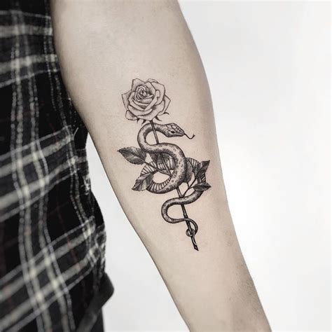 Snake and Rose Tattoo | Rose tattoos for women, Hand tattoos, Rose tattoos