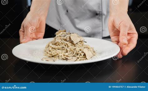 Restaurant Food Concept Chef Presenting His Dish To Customers Closeup