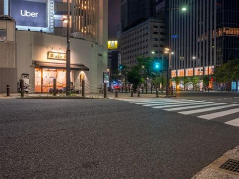 Nighttime In Tokyo Japan Streets Illuminated By Artificial Lights