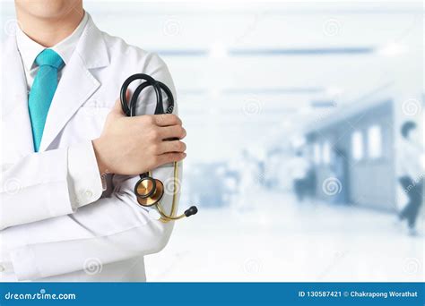 Doctor Leading A Medical At The Blurry Hospital Background Stock Image