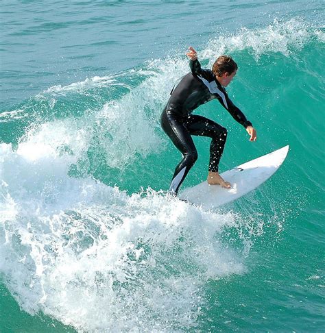 Surfer On Small Wave Photograph By Clarence Alford