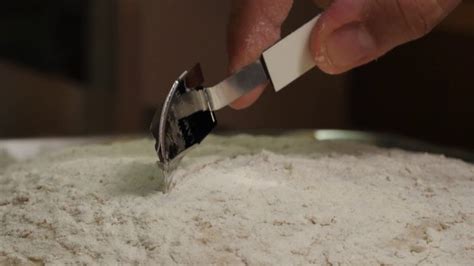 Cutting bread dough - Free Stock Video Footage | Coverr