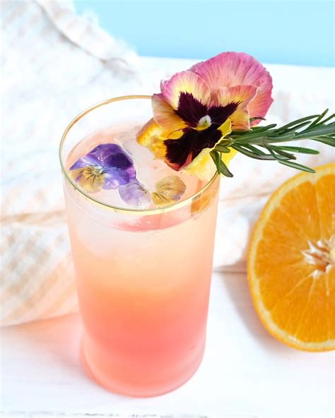 A Floral Summer Spritz Cheers To Edible Flowers In And On Our Drinks