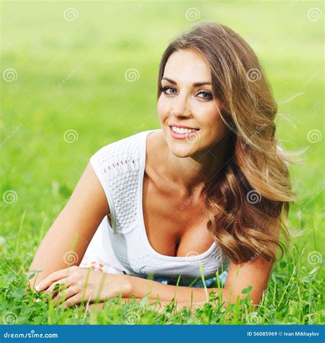 Young Woman In White Dress Lying On Grass Stock Image Image Of Lying