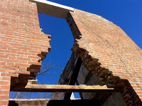 Preserving History: Brick Removal and Lintel Installation