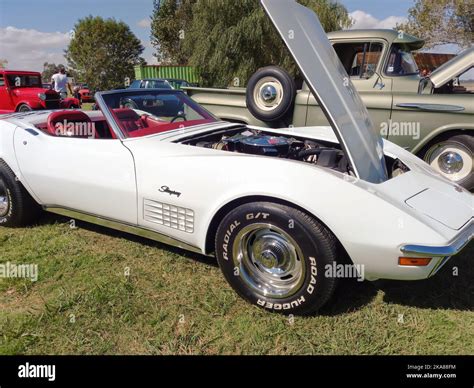 Old White Sport Chevrolet Corvette C3 Stingray Two Door Convertible Circa 1970 Open Hood Engine