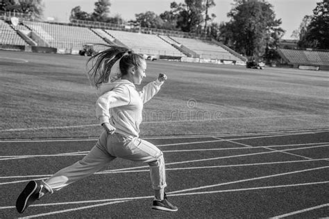 The Rule In Running Is Just Run Energetic Girl Run On Running Track