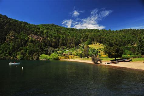 San Martin De Los Andes Lake And Transparent Waters White Sand