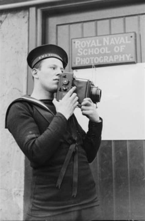 Royal Navy Photographer Outside The Door Of The Royal Naval School Of