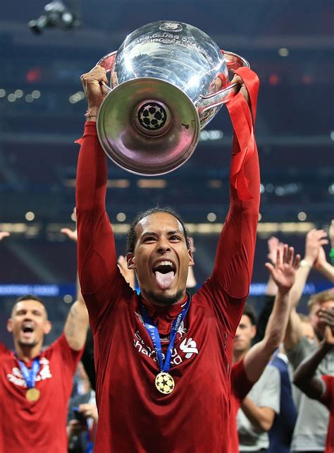 Virgil Van Dijk Holding Champions League Trophy