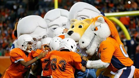 Denver Nuggets mascot lays out youth football player - Sports Illustrated