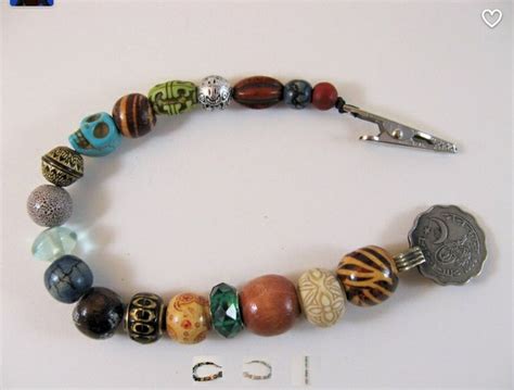 Jack Sparrow hair beads | Beaded jewelry, Hair beads, Pirate fashion