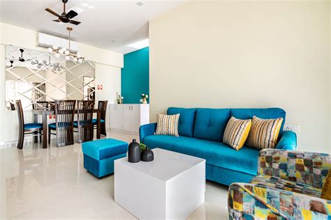 2 BHK Flat In Mumbai With Blue And Wood Living Room Design Livspace