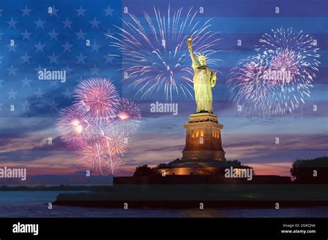 Fireworks Behind The Statue Of Liberty For Independence Day American