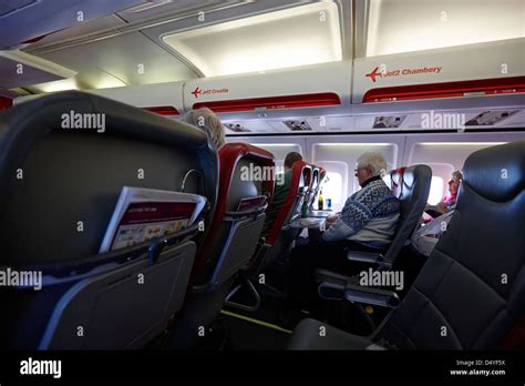 Interior Of Jet2 Aircraft Passenger Cabin In Flight Europe Stock Photo