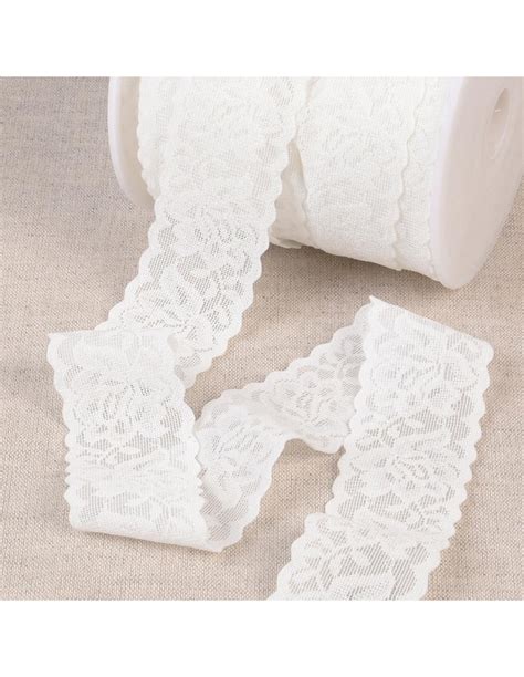 Elastique lingerie façon dentelle grandes fleurs blanc Conditionnement Au mètre