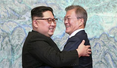 Donald Trump Effect Kim Jong Un Crosses Dmz Hugs Moon Jae In