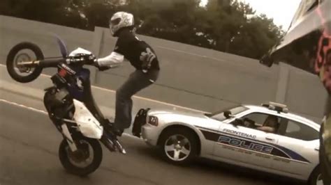 Motorcycle Stunts RIDE OF THE CENTURY ROC Bike Vs Police Street Stunt