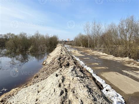 dam  earthen embankment protecting  road  spring floods