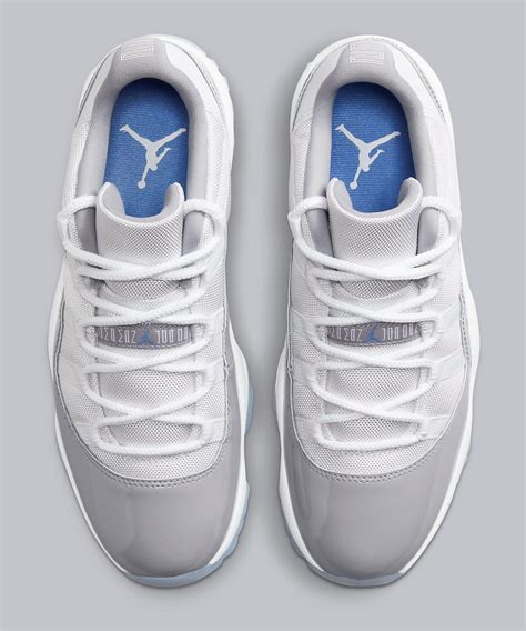Air Jordan 11 Low Whiteuniv Bluecement Grey Av2187 140 Release