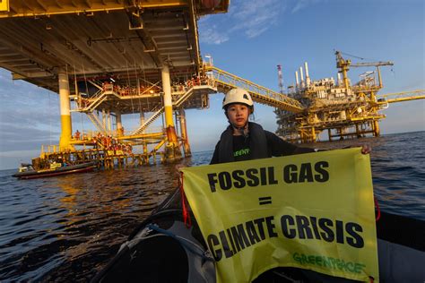 Greenpeace activists scale fossil gas platform in Gulf of Thailand to challenge offshore carbon ...