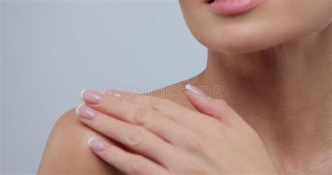 Close Up Portrait Of Young Woman With Smooth Healthy Skin Gently