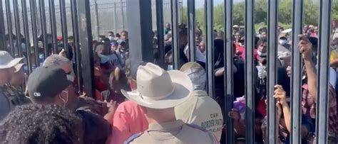 Video Shows Hundreds Of Migrants Swarm Through Border Gates Immediately Apprehended The Daily