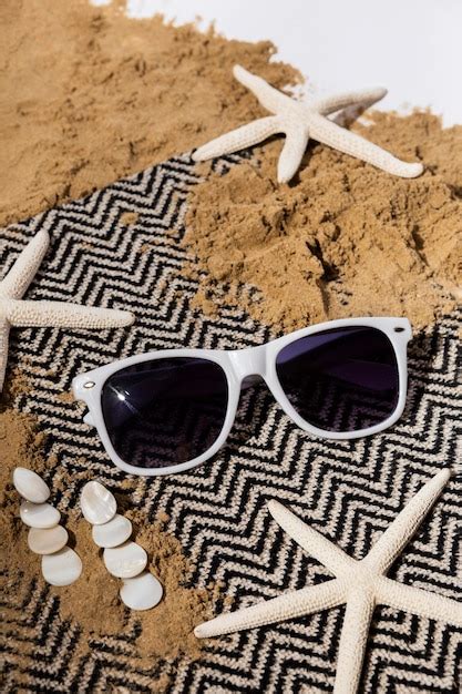 Images De Lunettes Soleil Sable T L Chargement Gratuit Sur Freepik