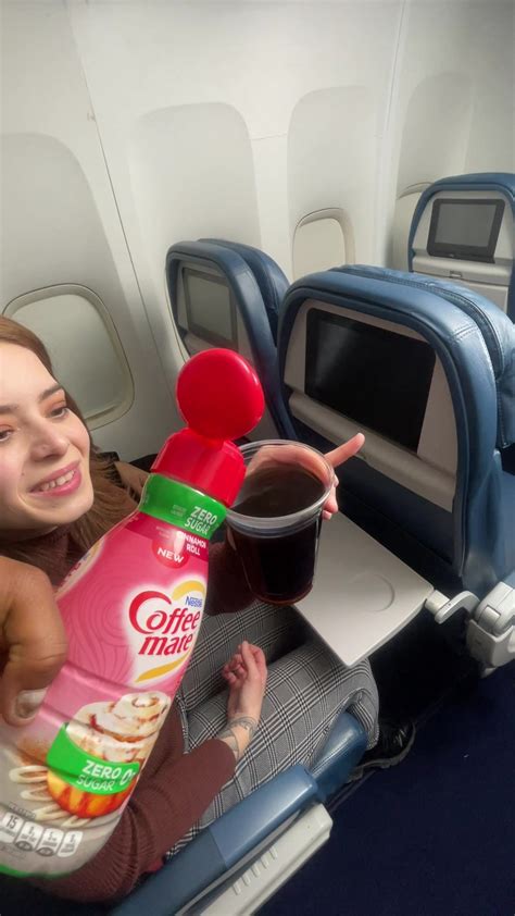 The Flight Attendant Helped Put Away The Last Passenger Luggage