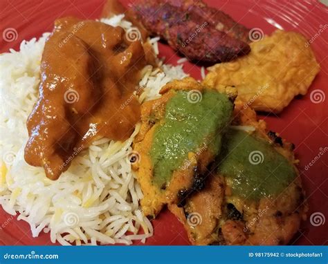 Indian Food Chicken Rice And Sauces On A Plate Stock Photo Image Of