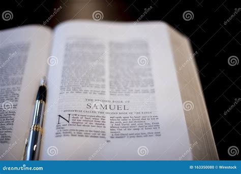 Closeup Shot of a Fountain Pen in the Middle of an Open Bible Stock ...